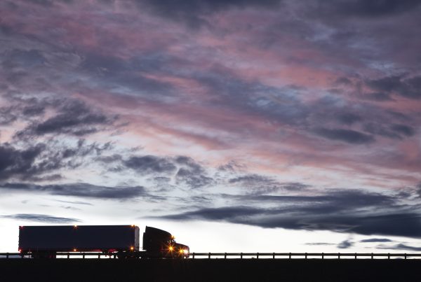 silhouette of a commercial truck driving on a high 2022 03 04 02 17 56 utc